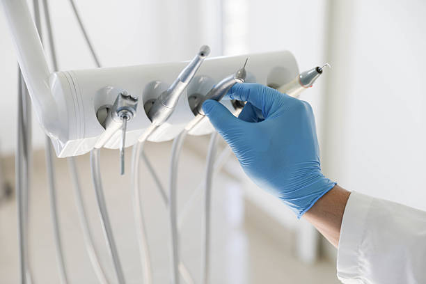 Professional Tooth Extraction technician working in Ingalls Park, IL